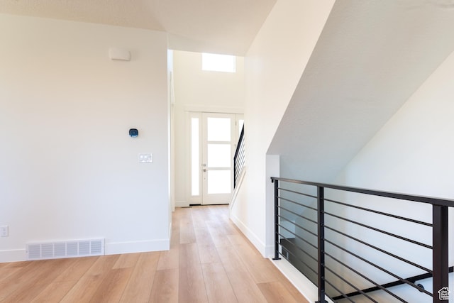 1699 N Siena Cir Unit 5, Pleasant Grove, UT 84062 - hallway with light wood-style flooring and baseboards