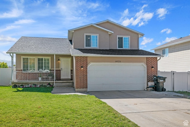 traditional-style home featuring brick siding, concrete driveway, an attached garage, and covered porch