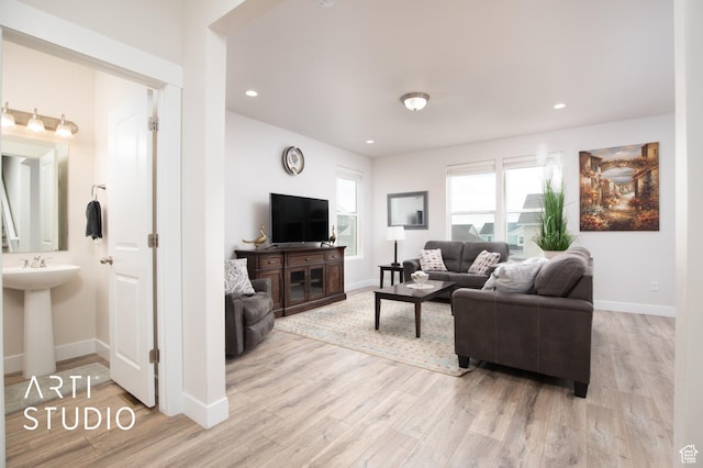 6637 W Terrace Sky Ln, West Jordan, UT 84081 - living area with light wood-style floors, baseboards, and recessed lighting