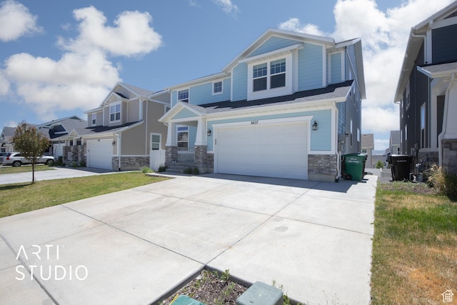 6637 W Terrace Sky Ln, West Jordan, UT 84081 - craftsman inspired home featuring stone siding, a garage, and concrete driveway