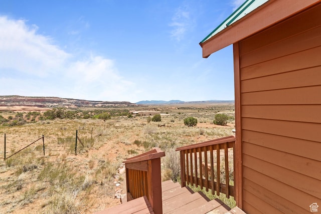 1 Pioneer Dr, La Sal, UT 84530 - deck with a mountain view, fence, a desert view, and a view of rural / pastoral area