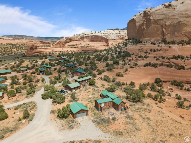 1 Pioneer Dr, La Sal, UT 84530 - aerial view of property and surrounding area with a desert landscape, a mountainous background, and rural landscape