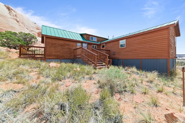 1 Pioneer Dr, La Sal, UT 84530 - back of house with metal roof, a wooden deck, and a standing seam roof