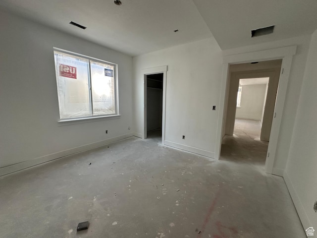 1768 N Siena Cir Unit 12, Pleasant Grove, UT 84062 - unfurnished bedroom with concrete floors and baseboards