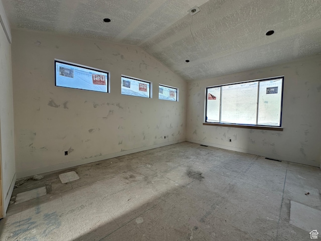 1768 N Siena Cir Unit 12, Pleasant Grove, UT 84062 - spare room with a textured ceiling and lofted ceiling