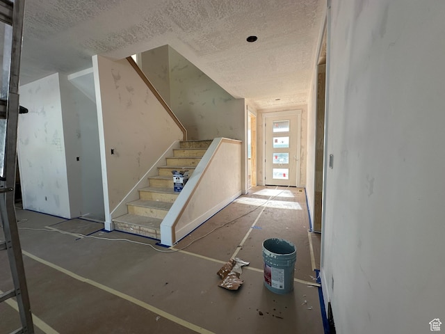 1768 N Siena Cir Unit 12, Pleasant Grove, UT 84062 - stairs featuring a textured ceiling