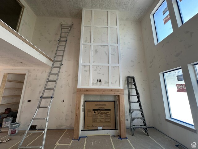 1768 N Siena Cir Unit 12, Pleasant Grove, UT 84062 - stairway featuring plenty of natural light and a towering ceiling