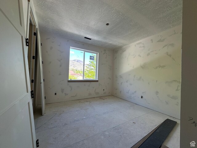 1768 N Siena Cir Unit 12, Pleasant Grove, UT 84062 - spare room featuring a textured ceiling