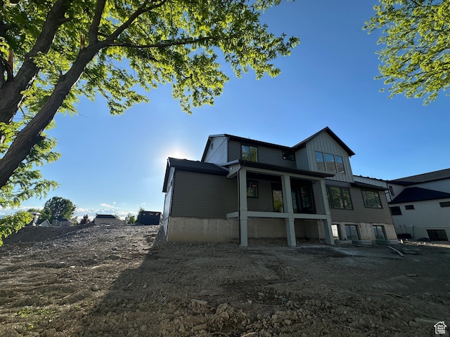 1768 N Siena Cir Unit 12, Pleasant Grove, UT 84062 - rear view of property featuring board and batten siding
