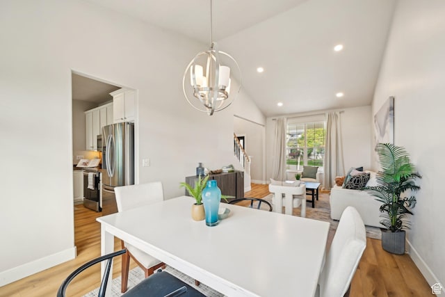 13994 S New Saddle Rd, Draper, UT 84020 - dining space featuring a chandelier, baseboards, light wood-style flooring, lofted ceiling, and recessed lighting