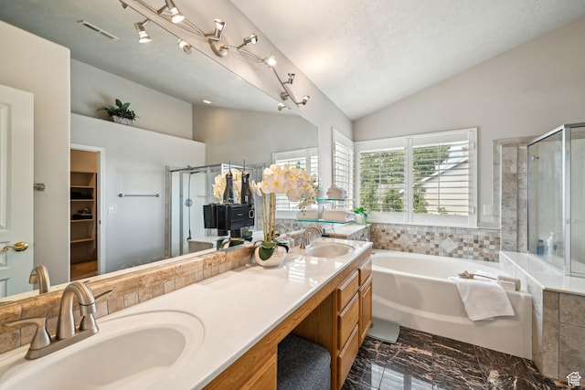 13994 S New Saddle Rd, Draper, UT 84020 - bathroom featuring vaulted ceiling, a shower stall, a bath, marble finish flooring, and double vanity