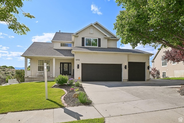 13994 S New Saddle Rd, Draper, UT 84020 - view of front of home featuring covered porch, stucco siding, driveway, a front yard, and an attached garage