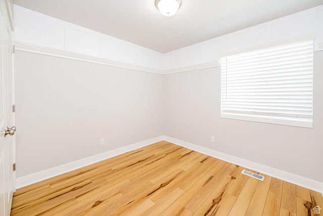 466 W 1595 N Unit 45-103, Logan, UT 84341 - spare room featuring baseboards and hardwood / wood-style flooring