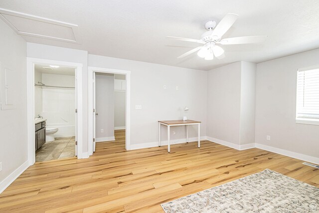466 W 1595 N Unit 45-103, Logan, UT 84341 - unfurnished bedroom featuring light wood finished floors, baseboards, attic access, and ensuite bathroom