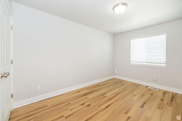 466 W 1595 N Unit 45-103, Logan, UT 84341 - spare room with baseboards and wood finished floors