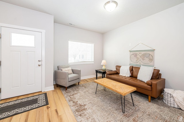 466 W 1595 N Unit 45-103, Logan, UT 84341 - living room with wood finished floors and baseboards