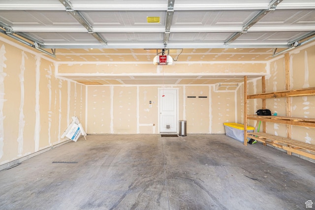 466 W 1595 N Unit 45-103, Logan, UT 84341 - garage featuring a garage door opener