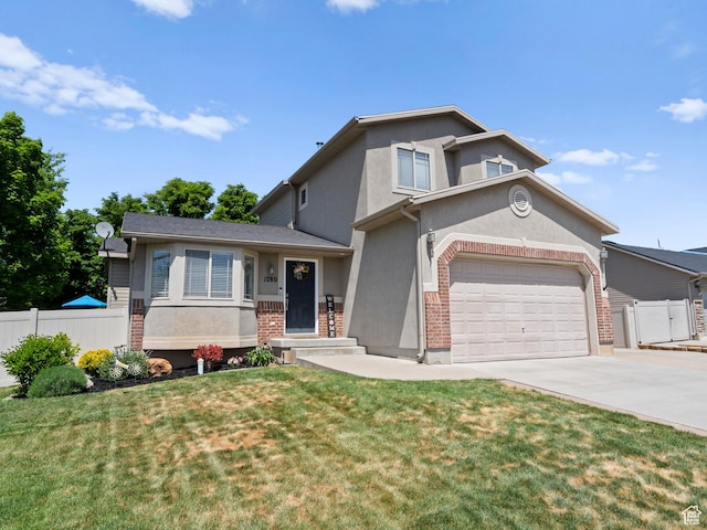 view of front of home featuring stucco siding, driveway, an attached garage, and brick siding