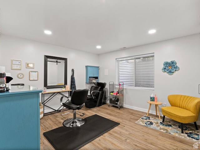 office space with light wood finished floors, baseboards, and recessed lighting