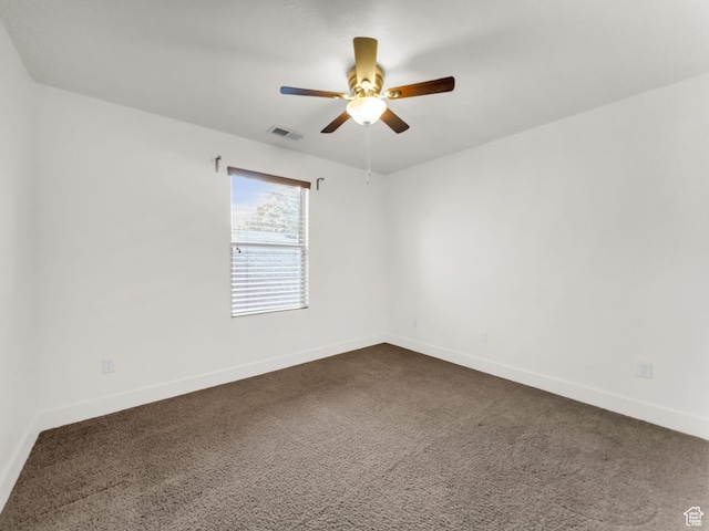 10342 S Millerton Dr, South Jordan, UT 84009 - unfurnished room featuring dark carpet, ceiling fan, and baseboards
