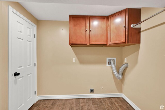 1383 N 4350 W, West Point, UT 84015 - laundry room with electric dryer hookup, wood finished floors, baseboards, cabinet space, and washer hookup