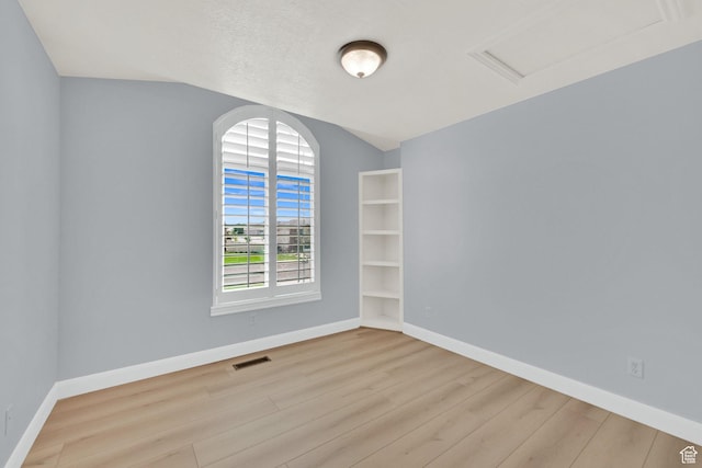 1383 N 4350 W, West Point, UT 84015 - unfurnished room featuring wood finished floors, baseboards, and lofted ceiling