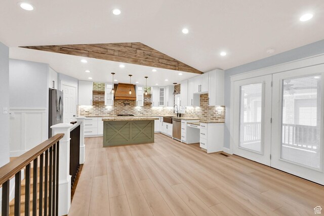 1383 N 4350 W, West Point, UT 84015 - kitchen with stainless steel appliances, custom exhaust hood, a sink, a kitchen island, and light wood finished floors