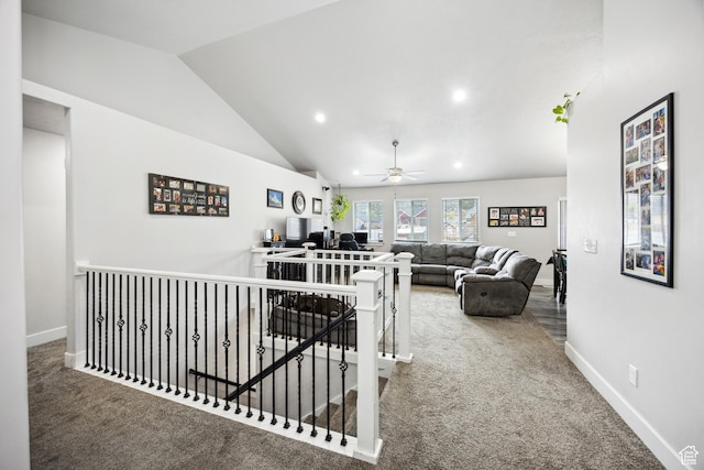 stairs with lofted ceiling, carpet floors, a ceiling fan, recessed lighting, and baseboards