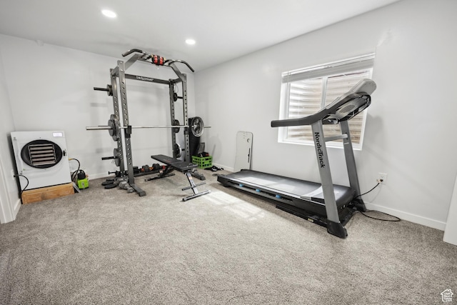 workout area featuring baseboards, recessed lighting, and carpet floors