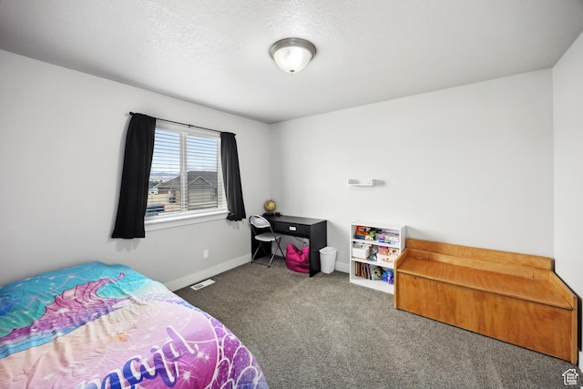 bedroom featuring carpet flooring and baseboards