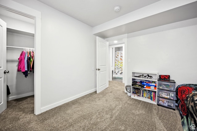 playroom with carpet flooring and baseboards