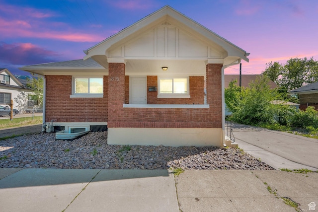 815 E 22nd St, Ogden, UT 84401 - view of front facade featuring brick siding and roof with shingles