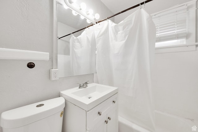 815 E 22nd St, Ogden, UT 84401 - full bathroom featuring toilet, a textured wall, vanity, and shower / bath combo with shower curtain