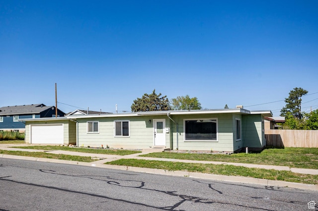 395 N 1st St, Tooele, UT 84074 - single story home with fence, an attached garage, and driveway