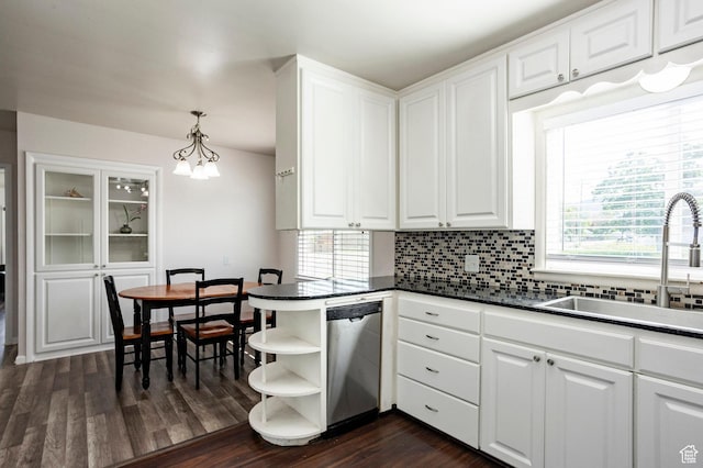 395 N 1st St, Tooele, UT 84074 - kitchen with dishwasher, open shelves, a sink, dark countertops, and backsplash