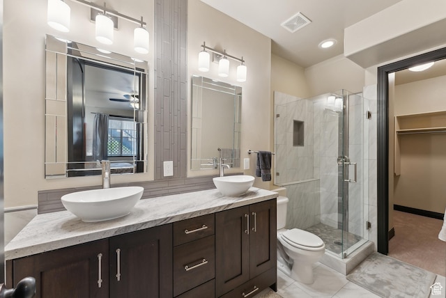 3029 Canyon Links Dr, Park City, UT 84098 - full bathroom featuring a stall shower, double vanity, and toilet