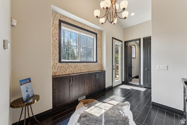 3029 Canyon Links Dr, Park City, UT 84098 - entrance foyer with wood tiled floors, a chandelier, baseboards, and recessed lighting
