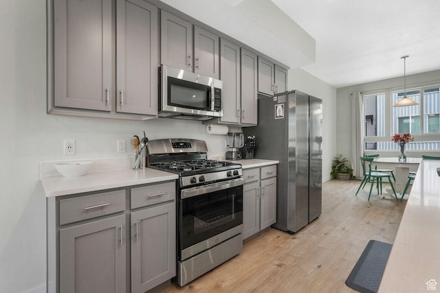 958 W 420 S, American Fork, UT 84003 - kitchen with stainless steel appliances, gray cabinetry, light countertops, and light wood-style floors