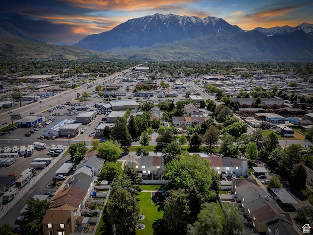 aerial view at dusk of a mountain view and a residential view