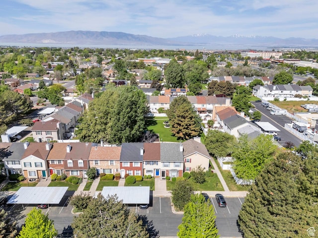 view of property location with mountains and nearby suburban area