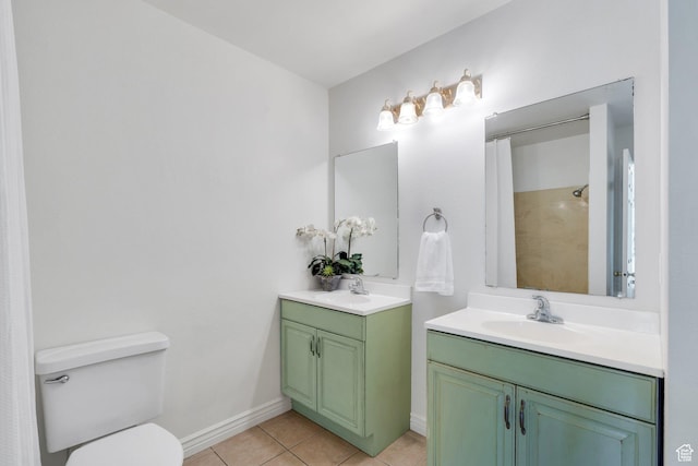 full bath featuring tile patterned floors, a shower with curtain, toilet, two vanities, and baseboards