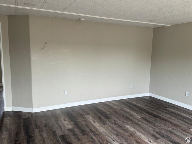 22 S 400 E, Myton, UT 84052 - spare room featuring dark wood finished floors and baseboards