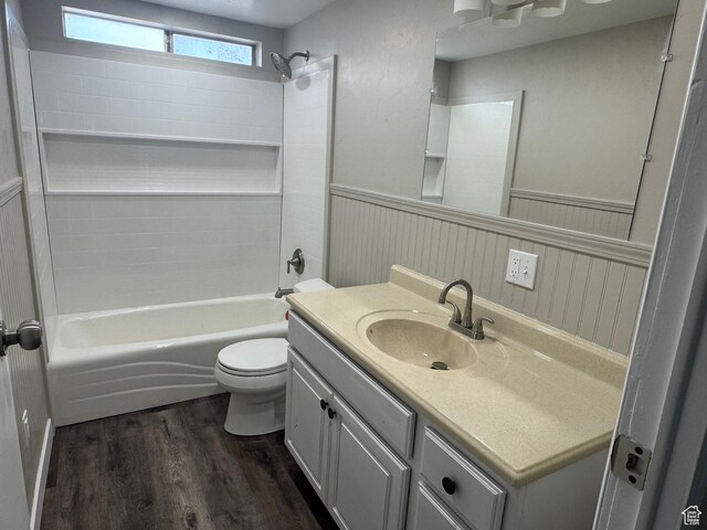 22 S 400 E, Myton, UT 84052 - bathroom featuring wainscoting, wood finished floors, toilet, vanity, and shower / bath combination