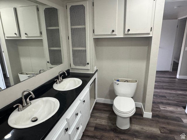 22 S 400 E, Myton, UT 84052 - full bathroom with baseboards, wood finished floors, and toilet