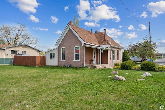 755 42nd St, South Ogden, UT 84403 - rear view of property with a chimney and brick siding