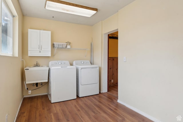 755 42nd St, South Ogden, UT 84403 - washroom featuring independent washer and dryer, light wood finished floors, cabinet space, and baseboards