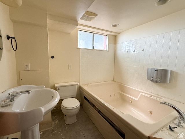 full bathroom with toilet and a sink