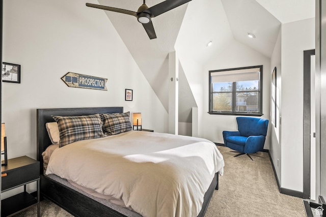 bedroom featuring vaulted ceiling, light carpet, ceiling fan, and baseboards