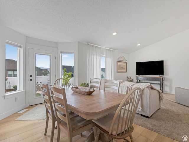 1245 N Clemente Way, Tooele, UT 84074 - dining room with healthy amount of natural light, light wood-style flooring, and recessed lighting