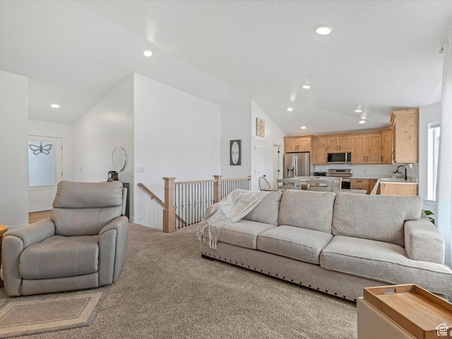 1245 N Clemente Way, Tooele, UT 84074 - living room featuring lofted ceiling, light colored carpet, and recessed lighting